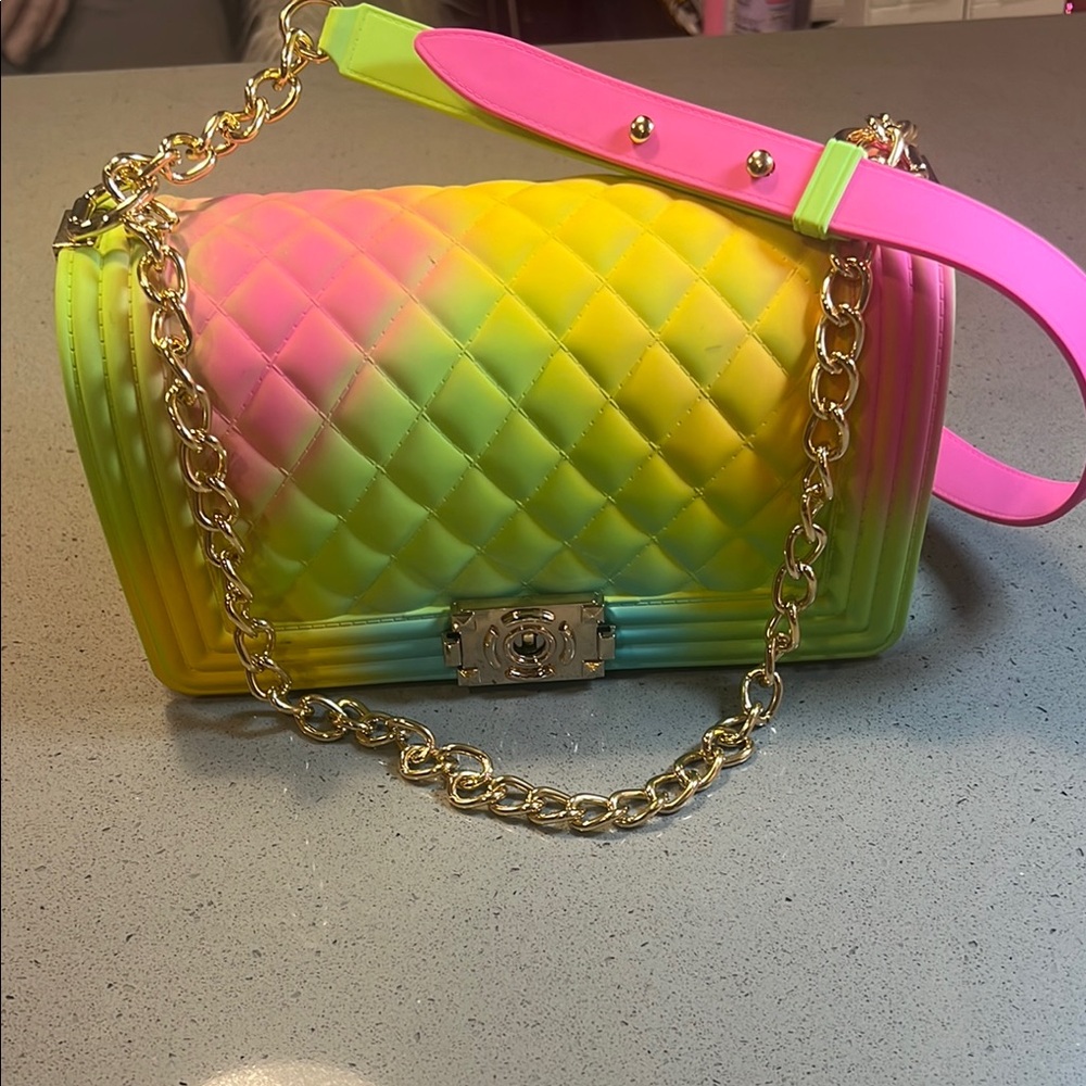 Pink and Green Crossbody Bag with Quilted Texture and Chain Strap